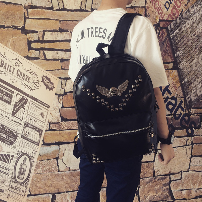 韩版时尚潮流铆钉真皮双肩包男女青年牛皮休闲电脑背包旅行包书包