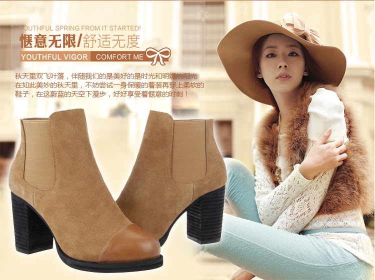 2014秋冬新品韩版高跟粗跟马丁靴真皮圆头短筒明星同款拼接女靴。